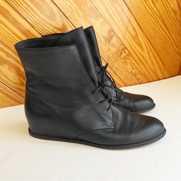 BEDFORD SLEEK LACE-UP BOOTIE in BLACK for Women | Stuart  Stuart Weitzman Black Leather Hidden Wedge Lace Up Bootie